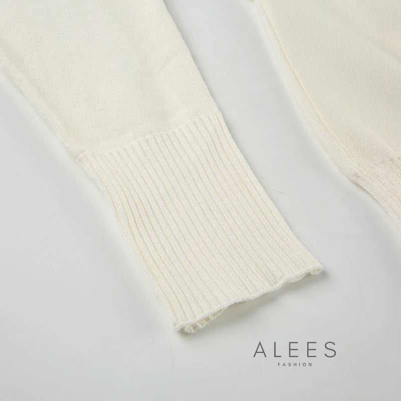 TIANA | Jersey de punto asimétrico hombro al aire