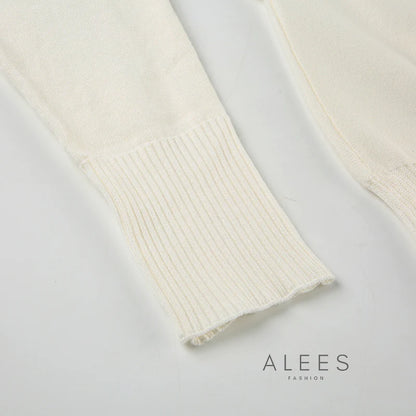 TIANA | Jersey de punto asimétrico hombro al aire