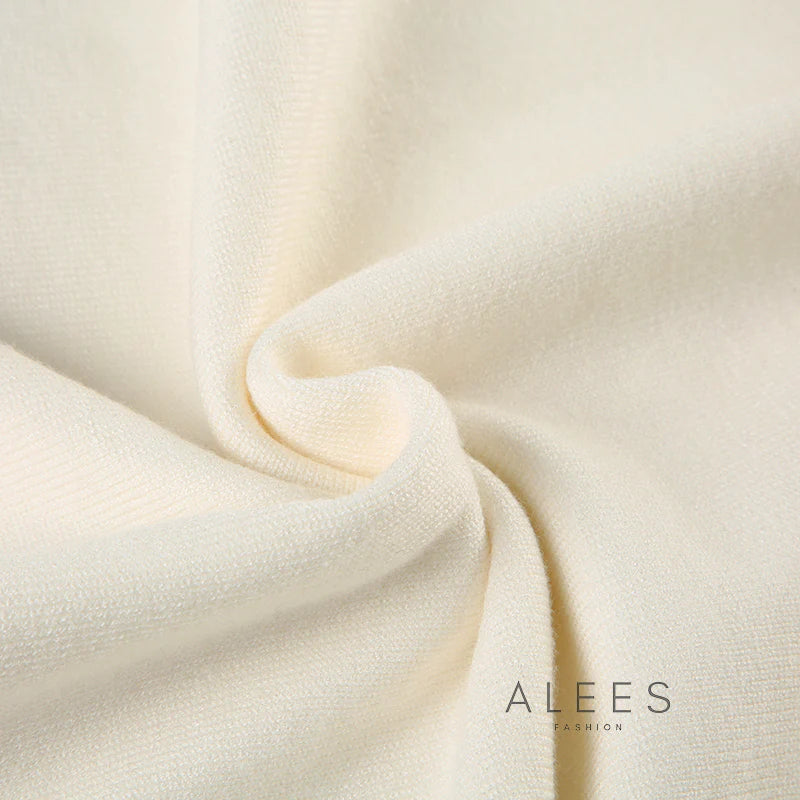 TIANA | Jersey de punto asimétrico hombro al aire